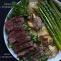 Rețetă pentru cină: Tagliata de vită cu cartofi la cuptor și sparanghel